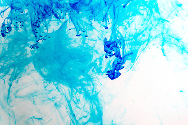 Abstract purple dye in water demonstrating fluid dynamics
