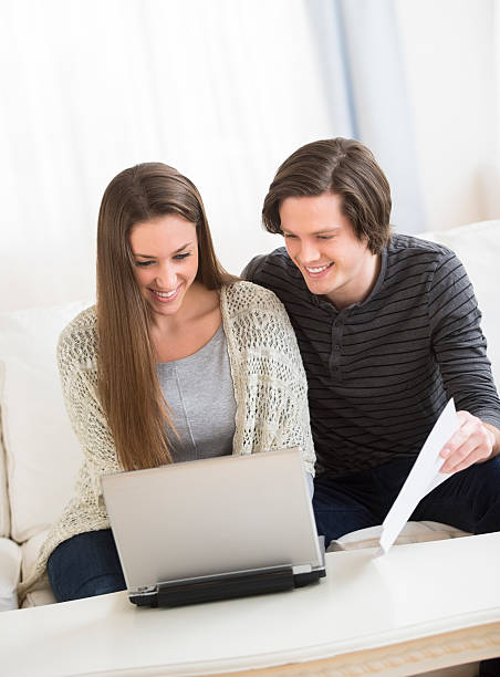 istock Couple Calculating Finances On Laptop 483767297