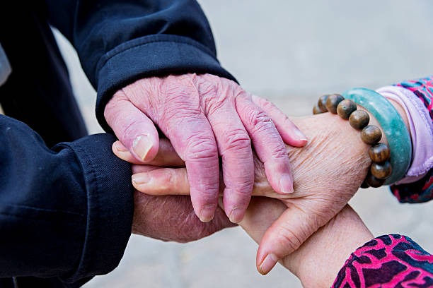istock Senior couple holding hands 483768762