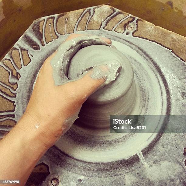 Working On The Wheel Stock Photo - Download Image Now - 2015, Activity, Adult