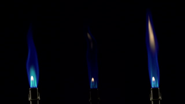 Blue Flames Burning From Bunsen Burners