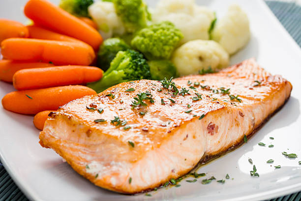 istock Fillet of salmon with mixed vegetables 483770177