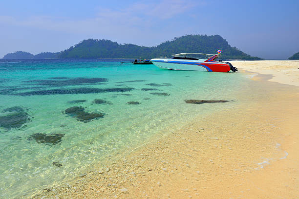 istock Boat parks on a beautiful beach at Lipe island 483770253