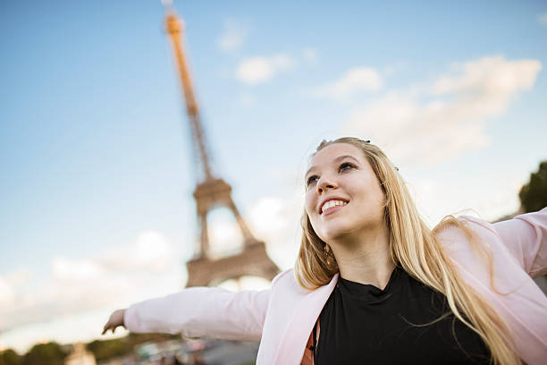 istock freedom tourist in paris against the tour Eiffel 483771606