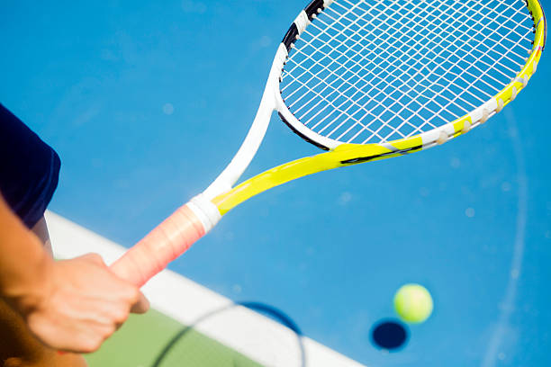 istock Closeup of a player holding the racquet warming up 483772044