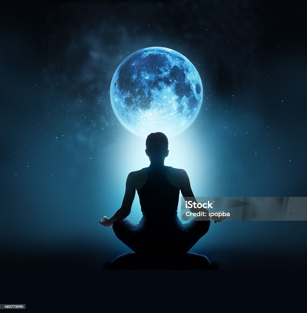 Abstract woman are meditating at blue full moon with star Abstract woman are meditating at blue full moon with star in dark night sky background Yoga Stock Photo