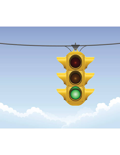 Yellow Traffic Light Yellow traffic light. Global Colors green light stoplight stock illustrations