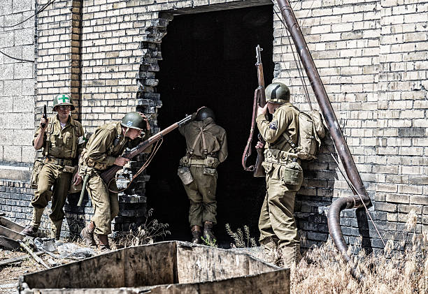 istock WWII US Army Infantry Squad Entering Building 483773964