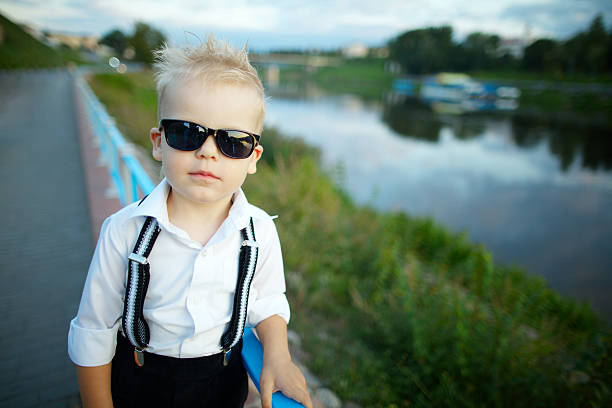 istock little gentleman with sunglasses outdoors 483774148