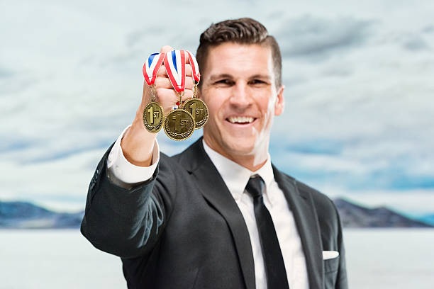 istock Businessman showing medals 483775028