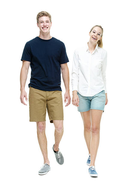istock Smiling couple holding hands and walking 483775046