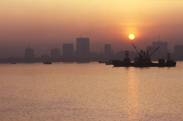 istock Shipping port at sunset 483783256