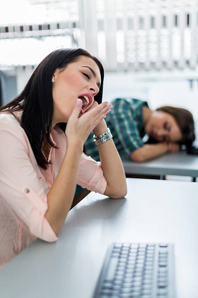 istock Young beautiful girl yawning during class 483783728