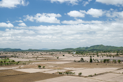 Mountain landscape and rice field with blue sky in Kanchanaburi, Thailand