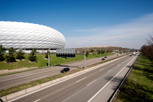 Munich, Germany - March 28, 2014: Allianz Arena is a football stadium in Munich , Bavaria. FC Bayern Munich and TSV 1860 Munich , two professional football clubs , have played their home games there at May 2005. The stadium was built near the highway A9 .