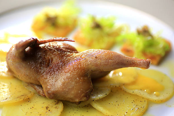 istock Roast chicken, quail on a platter 483786350