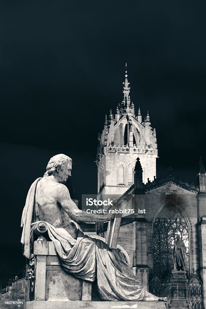 St Giles' Cathedral St Giles' Cathedral with David Hume statue as the famous landmark of Edinburgh. United Kingdom. David Hume - Philosopher Stock Photo