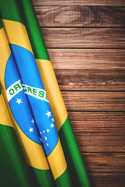 istock Brazilian flag on wood with copyspace 483787379