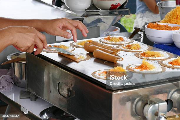 The Seller Is Grilling Thailand Traditional Filled Pancake Tart Stock Photo - Download Image Now