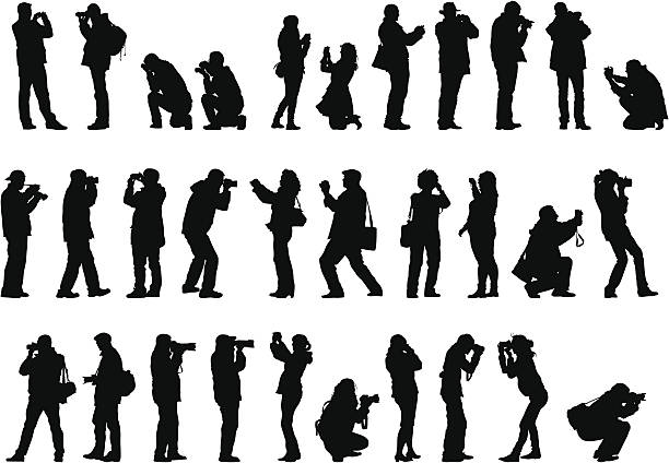 Men and woman with camera Men and woman with a photo camera paparazzi photographer illustrations stock illustrations
