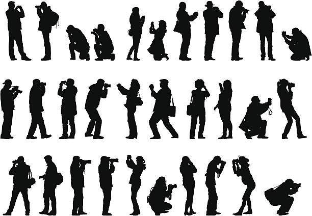 Men and woman with camera Men and woman with a photo camera photographer stock illustrations
