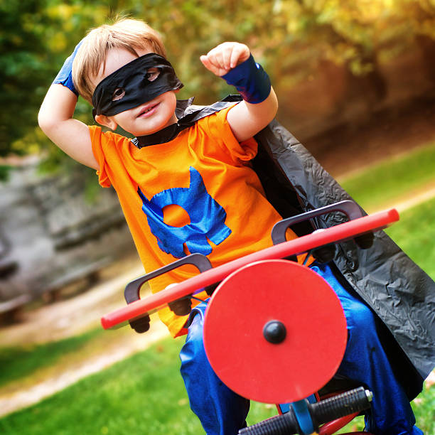 istock Little Superhero on an Airplane 483789971