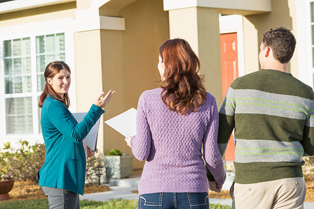 istock Young couple with real estate agent 483789989