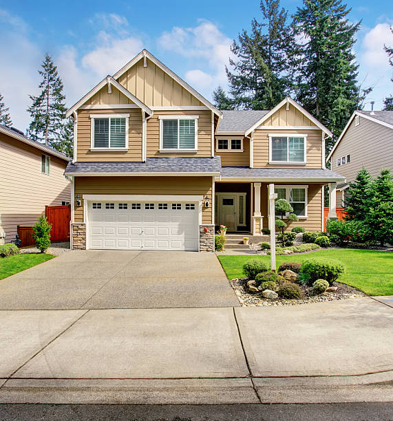 istock Modern northwest home with tan exterior, and garage. 483790458