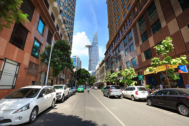 Hochiminh City, Vietnam - June 7, 2015: a street in downtown HCM overlooking the Bitexco tower, at an altitude Financial Tower stands 262.5 meters of it is the second tallest building in the world 124