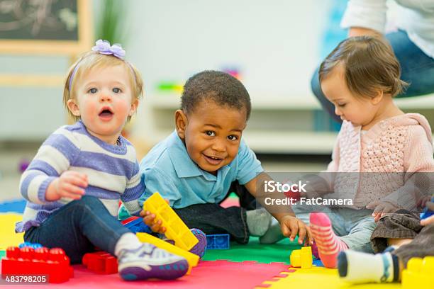 Babies Playing Stock Photo - Download Image Now - Child Care, Baby - Human Age, Toddler