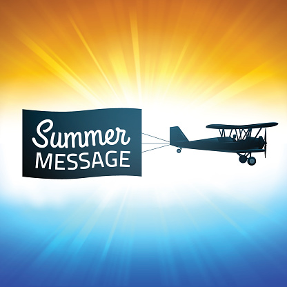 Message banner and biplane with sunset glow background. EPS 10 file. Transparency effects used on highlight elements.