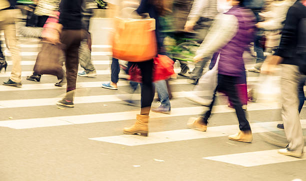 istock People walking on big city street 483798759