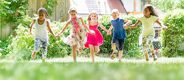 istock Kids running in the park 483800396