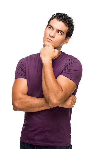istock Confused latin man with his fist under chin 483802159
