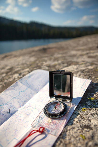 istock GPS and Compass on a map in the backcountry. 483802762