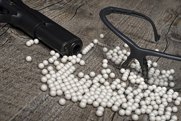 istock airsoft gun with glasses 483804163