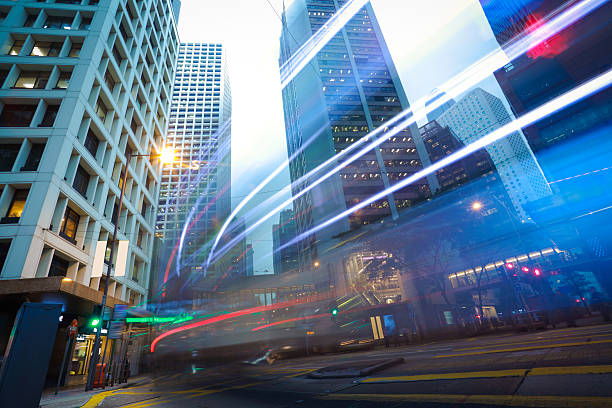 istock Road light trails on streetscape buildings in HongKong 483804449
