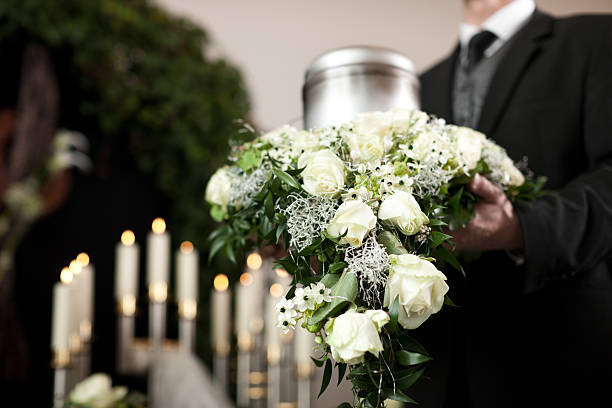Grief - Funeral and cemetery Religion, death and dolor  - funeral and cemetery; urn funeral funeral parlor photos stock pictures, royalty-free photos & images
