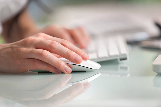 istock Close up of a hand operating mouse 483805467