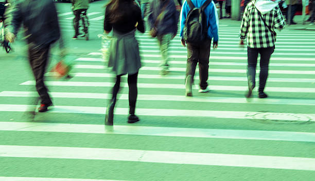 istock People walking on big city street 483805479