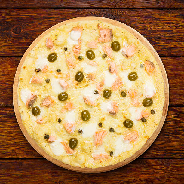 istock Delicious seafood pizza with olives 483807808
