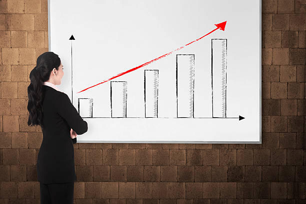 istock Back view young woman with white board 483808268