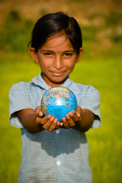 istock Indian Girl with Globe 483812400