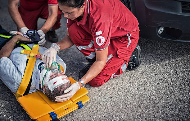 istock rescue team helping injured man 483816109
