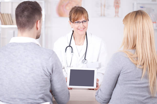 istock Woman with husband on consultation. 483817065