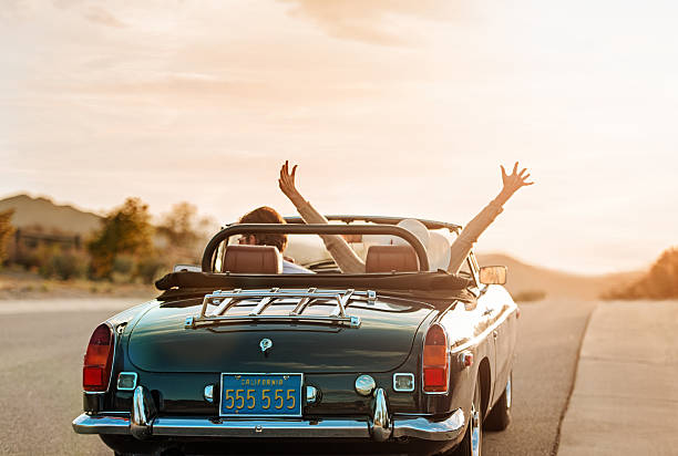 Mature couple on Roadtrip Mature Couple on Roadtrip convertible stock pictures, royalty-free photos & images