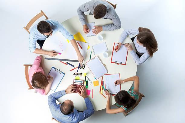 istock Top view of business team on workspace background 483820462