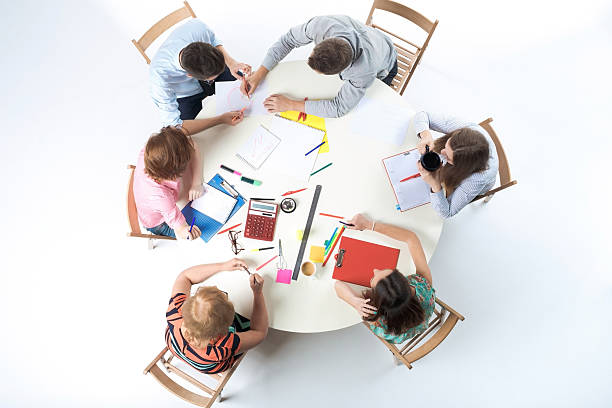 istock Top view of business team on workspace background 483820464