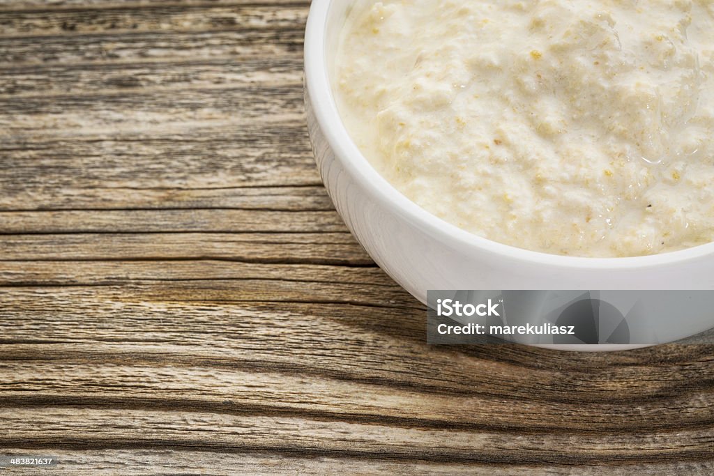 horseradish sauce small dish of a traditional horseradish sauce with eggs on a grained wood Bowl Stock Photo