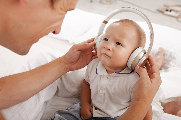 istock young father with his nine months old som on the 483821746